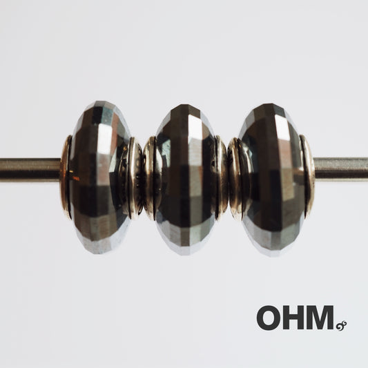 OHMnique - Darkness Reflection (Hematite)