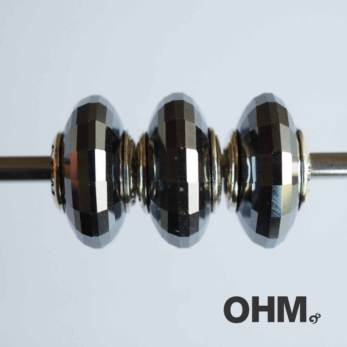 OHMnique - Darkness Reflection (Hematite)